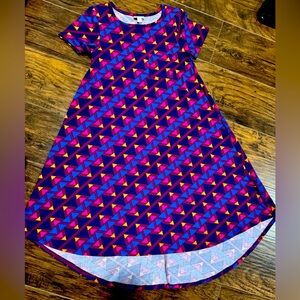 Short sleeve, " Carly style" dress. Longer in front, shorter in back.